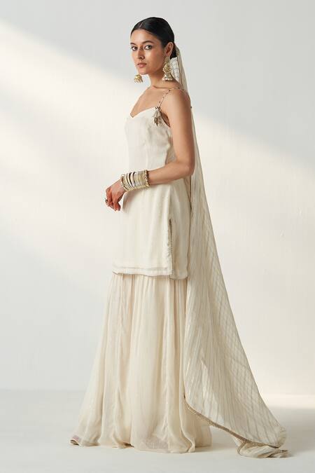 Shop Studio Bagechaa Ivory Georgette, Organza, Cotton Sequins, Pakhi Embroidered Kurta Sharara Set Online at Aza Fashions Shop_Studio Bagechaa_Ivory Georgette, Organza, Cotton Sequins, Pakhi Embroidered Kurta Sharara Set _Online_at_Aza_Fashions