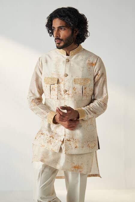 Buy Studio Bagechaa Yellow Chanderi Silk Embroidery Asymmetric Kurta Set With Bundi Online at Aza Fashions Buy_Studio Bagechaa_Yellow Chanderi Silk Embroidery Asymmetric Kurta Set With Bundi_Online_at_Aza_Fashions