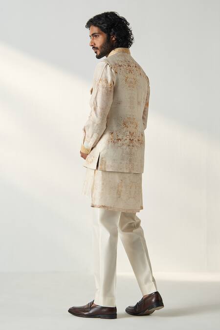 Shop Studio Bagechaa Yellow Chanderi Silk Embroidery Asymmetric Kurta Set With Bundi at Aza Fashions Shop_Studio Bagechaa_Yellow Chanderi Silk Embroidery Asymmetric Kurta Set With Bundi_at_Aza_Fashions