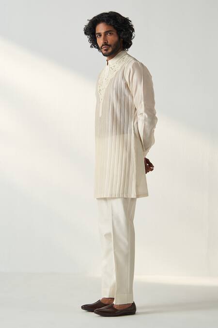Shop_Studio Bagechaa_Ivory Chanderi Silk Piping Ajal Pintuck Detailed Kurta With Pant _Online_at_Aza_Fashions