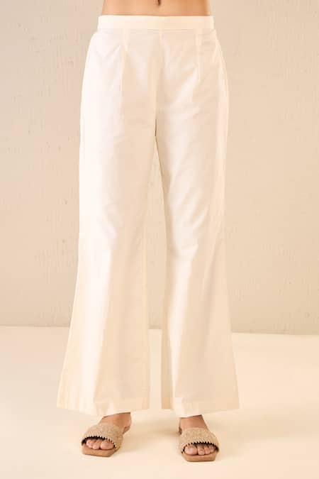 Shivani Bhargava Ivory Cotton Embroidered Thread Whispering Roses Tunic Top With Flared Pant Online at Aza Fashions Shivani Bhargava_Ivory Cotton Embroidered Thread Whispering Roses Tunic Top With Flared Pant _Online_at_Aza_Fashions