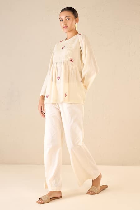 Buy Shivani Bhargava Ivory Cotton Embroidered Thread Whispering Roses Tunic Top With Flared Pant Online at Aza Fashions Buy_Shivani Bhargava_Ivory Cotton Embroidered Thread Whispering Roses Tunic Top With Flared Pant _Online_at_Aza_Fashions