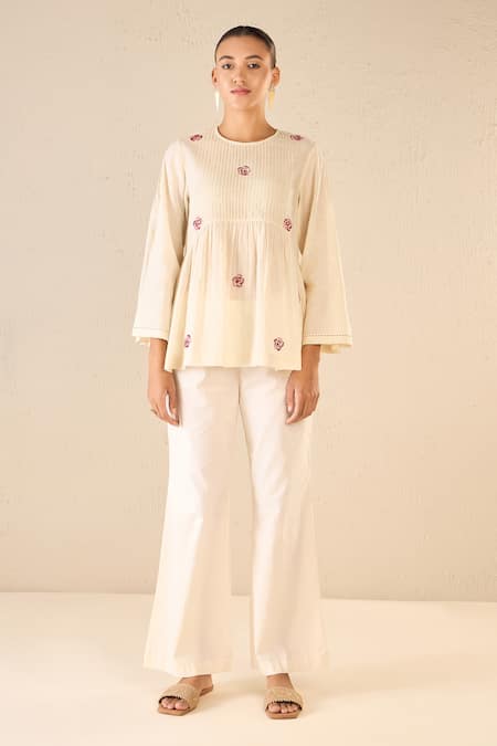 Shivani Bhargava Ivory Cotton Embroidered Thread Whispering Roses Tunic Top With Flared Pant at Aza Fashions Shivani Bhargava_Ivory Cotton Embroidered Thread Whispering Roses Tunic Top With Flared Pant _at_Aza_Fashions