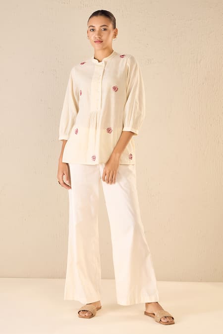 Shivani Bhargava Ivory Cotton Embroidered Thread Mandarin Rose Melody Top With Flared Pant Online at Aza Fashions Shivani Bhargava_Ivory Cotton Embroidered Thread Mandarin Rose Melody Top With Flared Pant _Online_at_Aza_Fashions