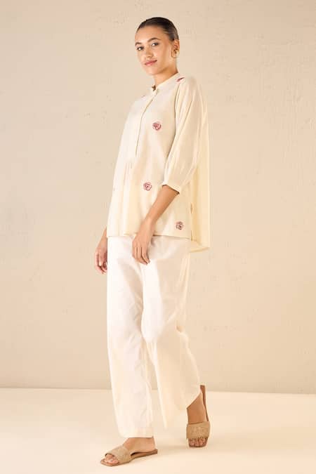 Shop Shivani Bhargava Ivory Cotton Embroidered Thread Mandarin Rose Melody Top With Flared Pant Online at Aza Fashions Shop_Shivani Bhargava_Ivory Cotton Embroidered Thread Mandarin Rose Melody Top With Flared Pant _Online_at_Aza_Fashions