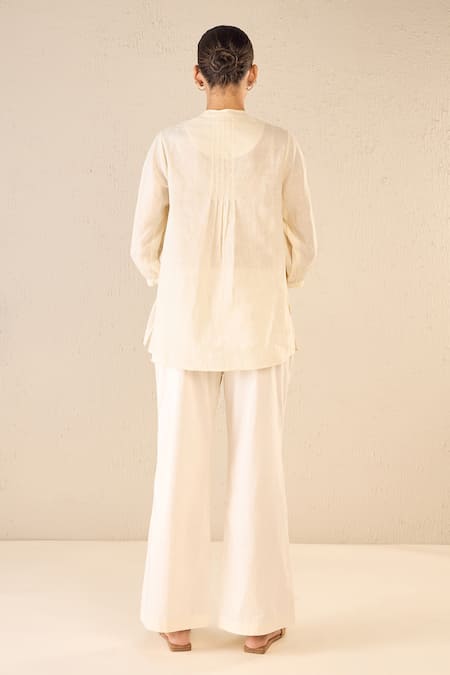 Shop Shivani Bhargava Ivory Cotton Embroidered Thread Mandarin Rose Melody Top With Flared Pant at Aza Fashions Shop_Shivani Bhargava_Ivory Cotton Embroidered Thread Mandarin Rose Melody Top With Flared Pant _at_Aza_Fashions