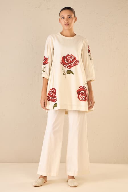 Shivani Bhargava Ivory Cotton Embroidered Thread Round Royal Rose Top With Flared Pant Online at Aza Fashions Shivani Bhargava_Ivory Cotton Embroidered Thread Round Royal Rose Top With Flared Pant _Online_at_Aza_Fashions