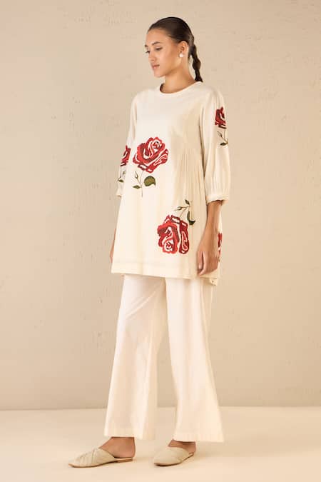 Shop Shivani Bhargava Ivory Cotton Embroidered Thread Round Royal Rose Top With Flared Pant Online at Aza Fashions Shop_Shivani Bhargava_Ivory Cotton Embroidered Thread Round Royal Rose Top With Flared Pant _Online_at_Aza_Fashions