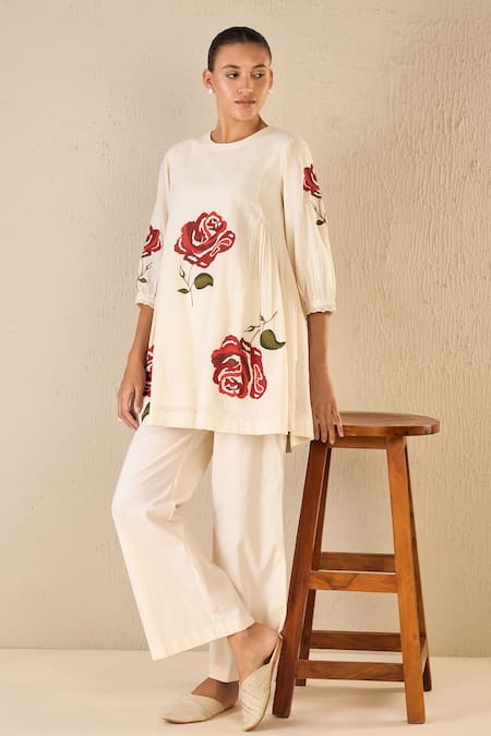 Shivani Bhargava Ivory Cotton Embroidery Round Neck Royal Rose Tunic Top at Aza Fashions Shivani Bhargava_Ivory Cotton Embroidery Round Neck Royal Rose Tunic Top _at_Aza_Fashions