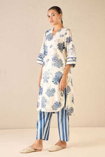 Shop Shivani Bhargava Blue Chanderi, Cotton Embroidery V-neck Floral Fantasy Print A-line Kurta Online at Aza Fashions Shop_Shivani Bhargava_Blue Chanderi, Cotton Embroidery V-neck Floral Fantasy Print A-line Kurta _Online_at_Aza_Fashions