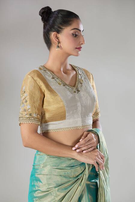 Sheela Suthar Gold Handwoven Pure Tissue Embroidered Zari V- Neck Suvarna Blouse at Aza Fashions Sheela Suthar_Gold Handwoven Pure Tissue Embroidered Zari V- Neck Suvarna Blouse _at_Aza_Fashions