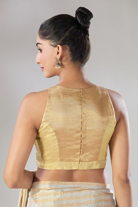 Shop Sheela Suthar Gold Handwoven Pure Tissue Halter Two Toned Sira Zari Blouse at Aza Fashions Shop_Sheela Suthar_Gold Handwoven Pure Tissue Halter Two Toned Sira Zari Blouse _at_Aza_Fashions