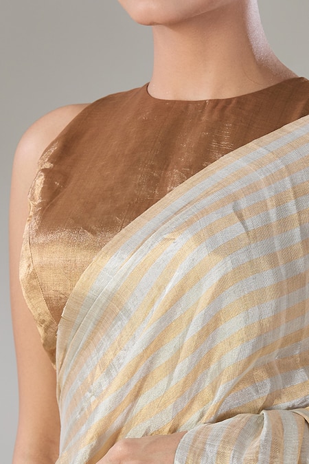 Shop Sheela Suthar Silver Handloom Cotton Zari Hima Striped Tissue Saree Online at Aza Fashions Shop_Sheela Suthar_Silver Handloom Cotton Zari Hima Striped Tissue Saree _Online_at_Aza_Fashions