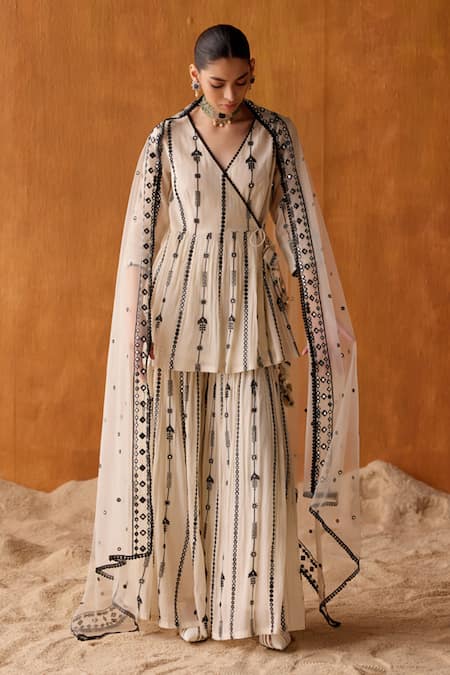 Buy Preevin Black Cotton, Stellar Vine Thread And Work Peplum Angarkha Kurta Sharara Set Online at Aza Fashions Buy_Preevin_Black Cotton, Stellar Vine Thread And Work Peplum Angarkha Kurta Sharara Set _Online_at_Aza_Fashions