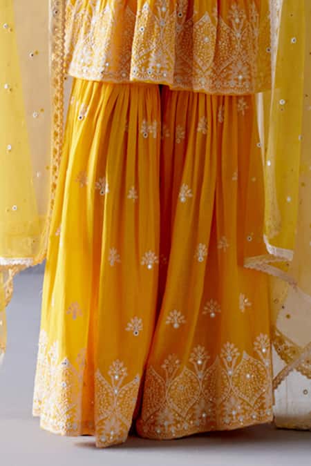 Preevin_Yellow Cotton, Tulle, Net Embroidery, And Thread Work Peplum Top Sharara Set _Online_at_Aza_Fashions