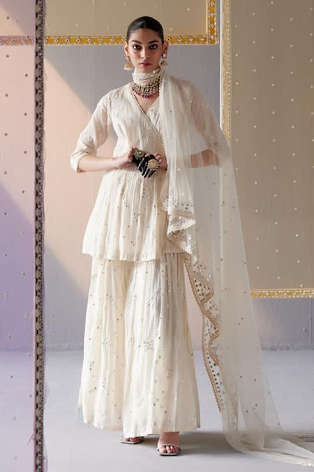 PREEVIN Off White Peplum Top And Sharara Cotton Mulmul Embroidered Mirror Big Kite Set