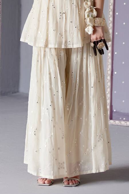 Buy Preevin Off White Cotton, Tulle, Net Mirrors, Embroidery Big Kite Peplum Top Sharara Set Online at Aza Fashions Buy_Preevin_Off White Cotton, Tulle, Net Mirrors, Embroidery Big Kite Peplum Top Sharara Set _Online_at_Aza_Fashions