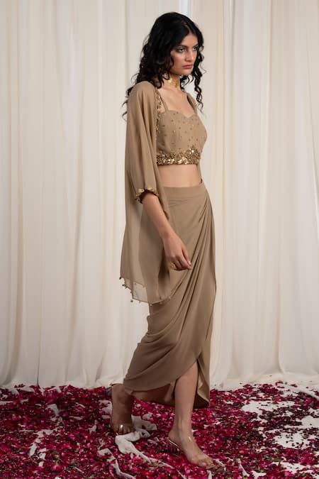 Shop Rirasa Beige Georgette Sequins, Gota Patti Mukuta Embellished Cape Draped Skirt Set Online at Aza Fashions Shop_Rirasa_Beige Georgette Sequins, Gota Patti Mukuta Embellished Cape Draped Skirt Set_Online_at_Aza_Fashions
