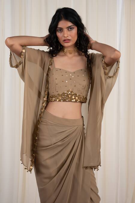 Rirasa Beige Georgette Sequins, Gota Patti Mukuta Embellished Cape Draped Skirt Set at Aza Fashions Rirasa_Beige Georgette Sequins, Gota Patti Mukuta Embellished Cape Draped Skirt Set_at_Aza_Fashions