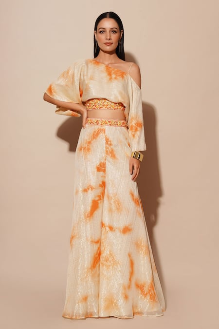 Chaashni by Maansi and Ketan Orange Foil Printed Georgette Embellished Abstract Top With Flared Pant