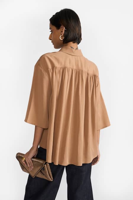 Shop Perona Brown Cotton Solid Collared Blaire Asymmetric Shirt at Aza Fashions Shop_Perona_Brown Cotton Solid Collared Blaire Asymmetric Shirt_at_Aza_Fashions