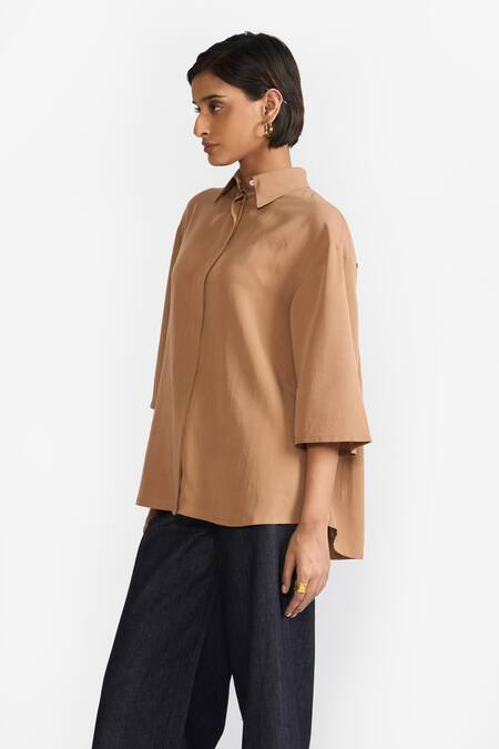 Buy Perona Brown Cotton Solid Collared Blaire Asymmetric Shirt Online at Aza Fashions Buy_Perona_Brown Cotton Solid Collared Blaire Asymmetric Shirt_Online_at_Aza_Fashions