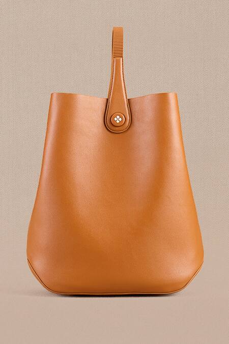 Shop Ampm Brown Cut Work Maira Bucket Bag Online at Aza Fashions Shop_Ampm_Brown Cut Work Maira Bucket Bag_Online_at_Aza_Fashions