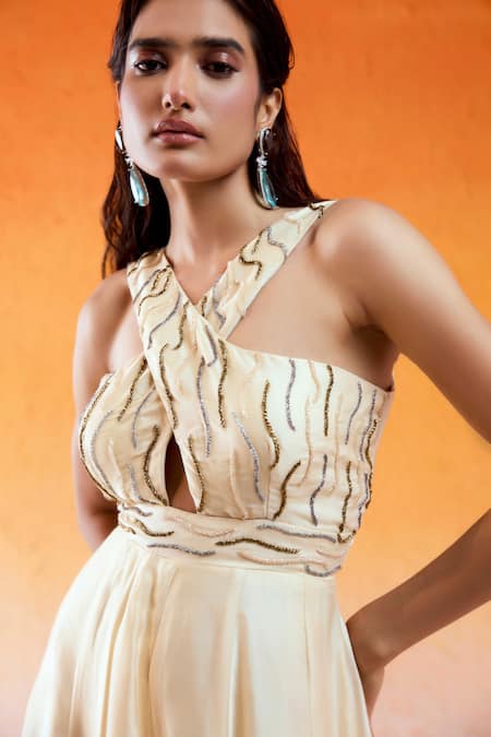 Redpine Designs Ivory Crepe, Viscose, Modal, Satin Embroidery Halter Neck Criss Cross Jumpsuit at Aza Fashions Redpine Designs_Ivory Crepe, Viscose, Modal, Satin Embroidery Halter Neck Criss Cross Jumpsuit _at_Aza_Fashions