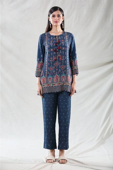 Naintara Bajaj Blue Muslin Tassels Round Neck Short Tunic And Pant Set at Aza Fashions Naintara Bajaj_Blue Muslin Tassels Round Neck Short Tunic And Pant Set _at_Aza_Fashions