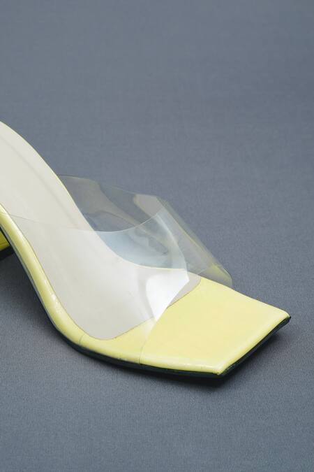 Sana K luxurious Footwear Yellow Le Transparent Strap Slip On Heels at Aza Fashions Sana K luxurious Footwear_Yellow Le Transparent Strap Slip On Heels _at_Aza_Fashions