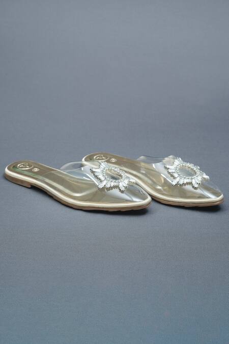 Shop Sana K luxurious Footwear Gold Star Swarovski Bloom Embellished Clear Flats at Aza Fashions Shop_Sana K luxurious Footwear_Gold Star Swarovski Bloom Embellished Clear Flats _at_Aza_Fashions