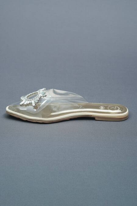 Sana K luxurious Footwear Gold Star Swarovski Bloom Embellished Clear Flats Online at Aza Fashions Sana K luxurious Footwear_Gold Star Swarovski Bloom Embellished Clear Flats _Online_at_Aza_Fashions