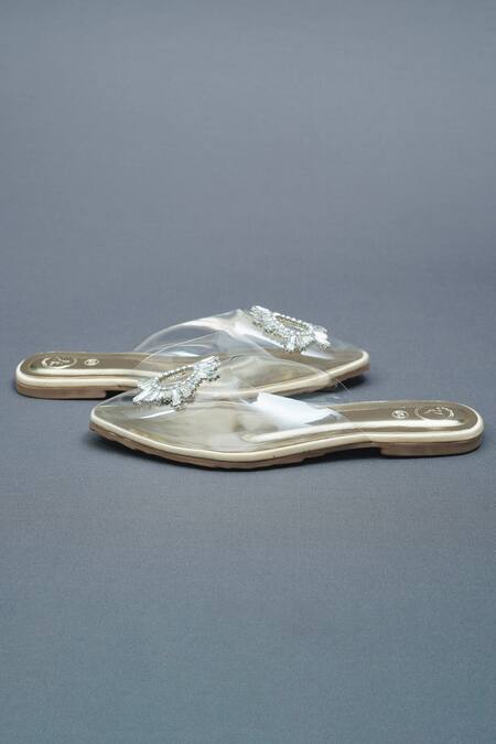 Shop Sana K luxurious Footwear Gold Star Swarovski Bloom Embellished Clear Flats Online at Aza Fashions Shop_Sana K luxurious Footwear_Gold Star Swarovski Bloom Embellished Clear Flats _Online_at_Aza_Fashions