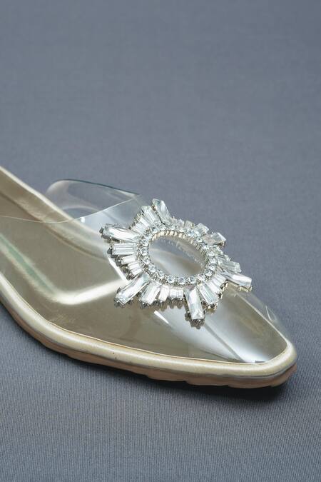 Sana K luxurious Footwear Gold Star Swarovski Bloom Embellished Clear Flats at Aza Fashions Sana K luxurious Footwear_Gold Star Swarovski Bloom Embellished Clear Flats _at_Aza_Fashions