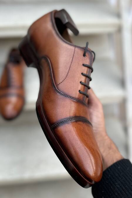 Shop Fellmonger Brown Solid Plain Cap Toe Lace-up Oxford Shoes Online at Aza Fashions Shop_Fellmonger_Brown Solid Plain Cap Toe Lace-up Oxford Shoes _Online_at_Aza_Fashions