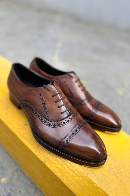 Shop_Fellmonger_Brown Solid Lace-up Punched Oxford Shoes _Online_at_Aza_Fashions