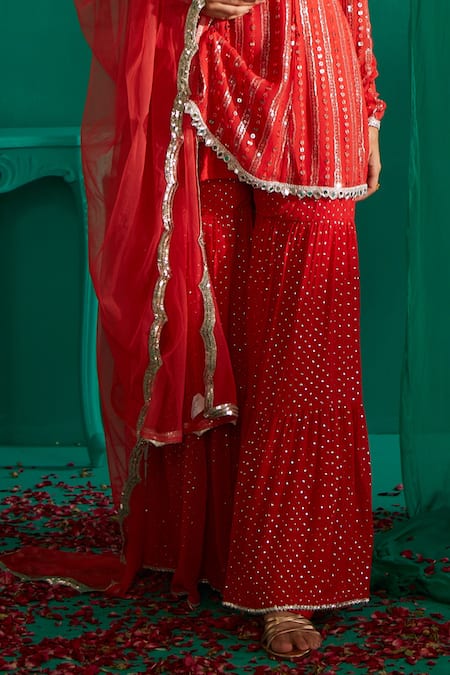 Mustard Moon By Neyha And Vrinda Red Georgette, Net Sequins, Embroidery Round And Thread Work Kurta Sharara Set at Aza Fashions Mustard Moon By Neyha And Vrinda_Red Georgette, Net Sequins, Embroidery Round And Thread Work Kurta Sharara Set _at_Aza_Fashions