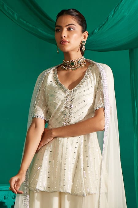 Mustard Moon By Neyha And Vrinda_Ivory Georgette, Net Mirrors, Sequins Work Peplum Kurta Sharara Set _Online_at_Aza_Fashions