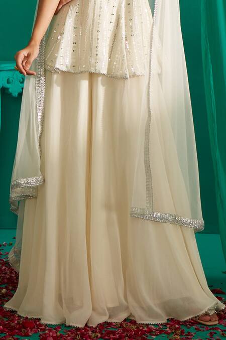 Buy_Mustard Moon By Neyha And Vrinda_Ivory Georgette, Net Mirrors, Sequins Work Peplum Kurta Sharara Set _Online_at_Aza_Fashions