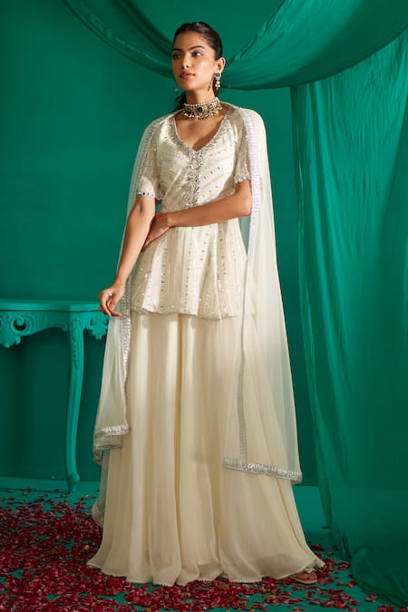 Shop_Mustard Moon By Neyha And Vrinda_Ivory Georgette, Net Mirrors, Sequins Work Peplum Kurta Sharara Set _Online_at_Aza_Fashions