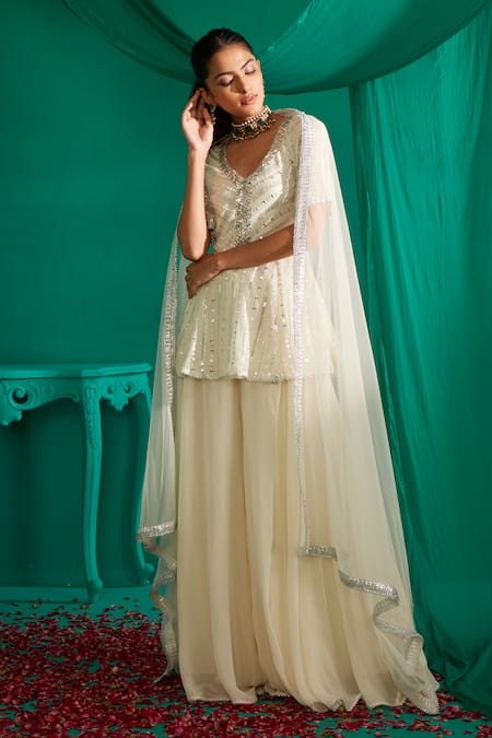 Buy_Mustard Moon By Neyha And Vrinda_Ivory Georgette, Net Mirrors, Sequins Work Peplum Kurta Sharara Set 
