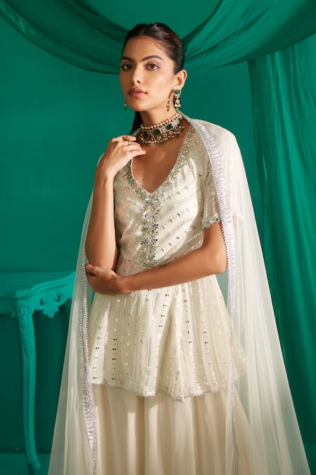 Shop_Mustard Moon By Neyha And Vrinda_Ivory Georgette, Net Mirrors, Sequins Work Peplum Kurta Sharara Set 
