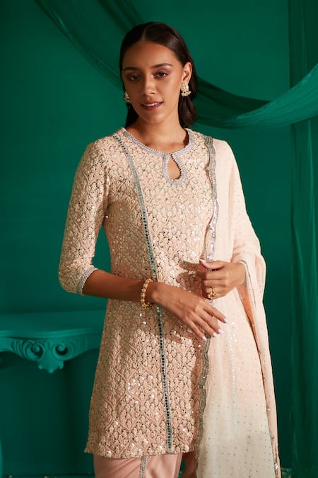 Mustard Moon By Neyha And Vrinda_Peach Georgette, Satin Sequins, Embroidery Round Neck Kurta Tulip Pant Set _at_Aza_Fashions