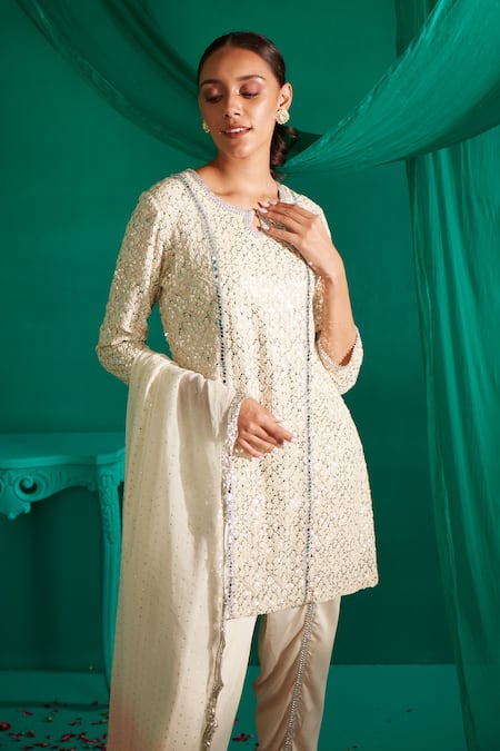 Shop_Mustard Moon By Neyha And Vrinda_Ivory Georgette, Satin Sequins, Embroidery Round Butti Kurta Tulip Pant Set _Online_at_Aza_Fashions
