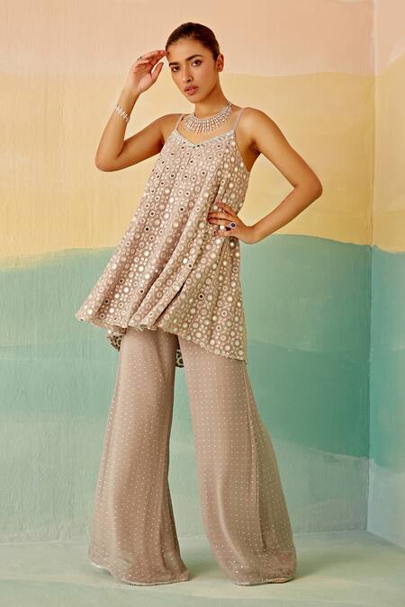Mustard Moon By Neyha And Vrinda Silver Georgette Mirrors V-neck Embroidered Short Tunic And Flared Pant Set at Aza Fashions Mustard Moon By Neyha And Vrinda_Silver Georgette Mirrors V-neck Embroidered Short Tunic And Flared Pant Set_at_Aza_Fashions