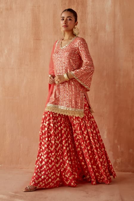 Shop Mustard Moon By Neyha And Vrinda Coral Georgette Mirrors, Sequins, Embroidery V-neck Kurta Sharara Set at Aza Fashions Shop_Mustard Moon By Neyha And Vrinda_Coral Georgette Mirrors, Sequins, Embroidery V-neck Kurta Sharara Set _at_Aza_Fashions