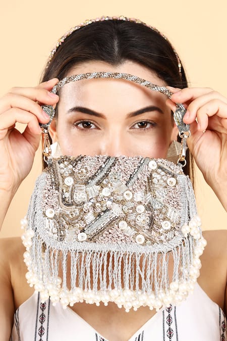 Born Flash_Silver Crystals, Pearls, Beads Glimmer Embellished Peral Tasselled Bag _Online_at_Aza_Fashions