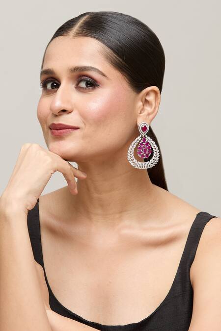 Chaotiq By Arti White Stones Floral Studded Drop Earrings at Aza Fashions Chaotiq By Arti_White Stones Floral Studded Drop Earrings_at_Aza_Fashions