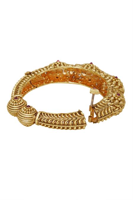 Chaotiq By Arti Gold Plated Floral Carved Bangles - Set Of 2 at Aza Fashions Chaotiq By Arti_Gold Plated Floral Carved Bangles - Set Of 2_at_Aza_Fashions