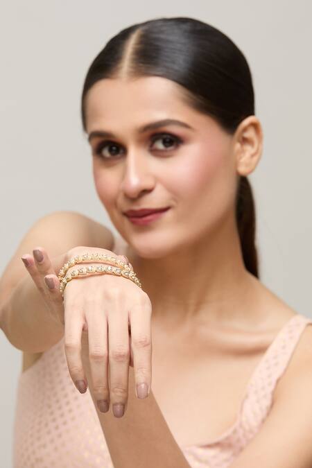Shop Chaotiq By Arti Gold Plated Imitation Diamonds Studded Meenakari Bangles - Set Of 2 Online at Aza Fashions Shop_Chaotiq By Arti_Gold Plated Imitation Diamonds Studded Meenakari Bangles - Set Of 2_Online_at_Aza_Fashions
